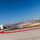Turn 13, where you can see the big difference between the paved track used as a joker lap and the dirt shortcut used by ARX.